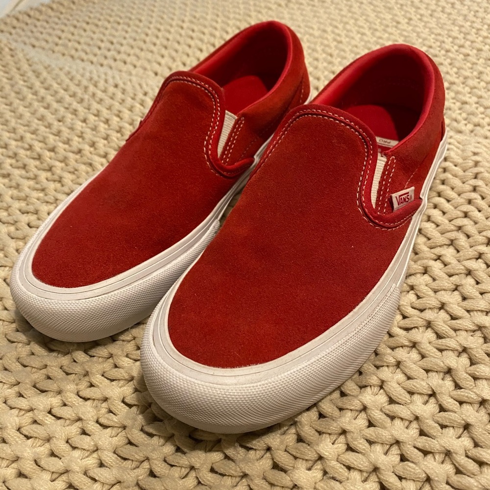 Red suede slip on vans